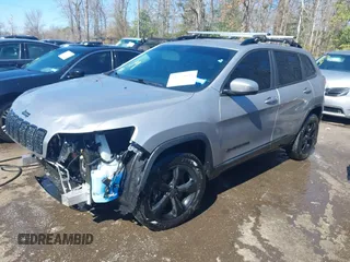 2020 Jeep Cherokee Altitude with VIN 1C4PJMLN6LD541335, listed as a IAAI auction lot 41750648 with 66,880 mi miles. Bid and sale history available at carsss.com. Image 2.