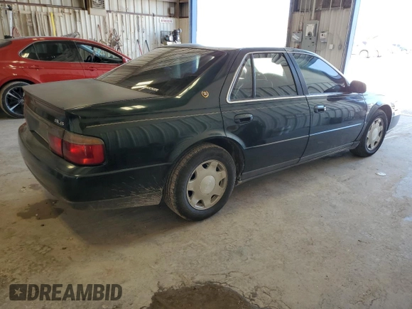1999 Cadillac Seville Luxury SLS z VIN 1G6KS54Y5XU920020, wystawiony jako Copart lot #53956115 z przebiegiem 104 096 mil mil oraz Czysty tytuł • Clean title. Historia ofert i sprzedaży dostępna na DreamBid. Obrazek 3.