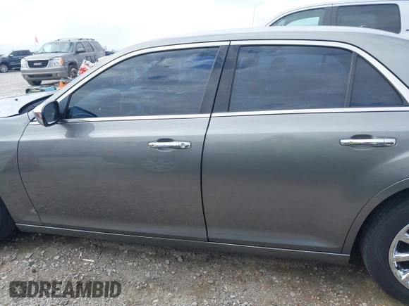 2012 Chrysler 300 Limited with VIN 2C3CCACG4CH308408, listed as a IAAI auction lot 41734589 with 135,813 mi miles. Bid and sale history available at carsss.com. Image 14.