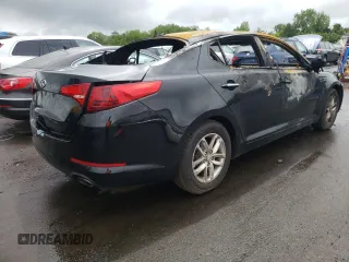 2013 Kia Optima LX z VIN 5XXGM4A72DG221738, wystawiony jako Copart lot #58740985 z przebiegiem Nie podano mil oraz Szkoda całkowita • Salvage title. Historia ofert i sprzedaży dostępna na DreamBid. Obrazek 3.