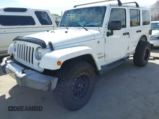2017 Jeep Wrangler Unlimited Sahara with VIN 1C4BJWEG5HL588535, listed as a IAAI auction lot 42013571 with 70,012 mi miles. Bid and sale history available at carsss.com. Image 2.