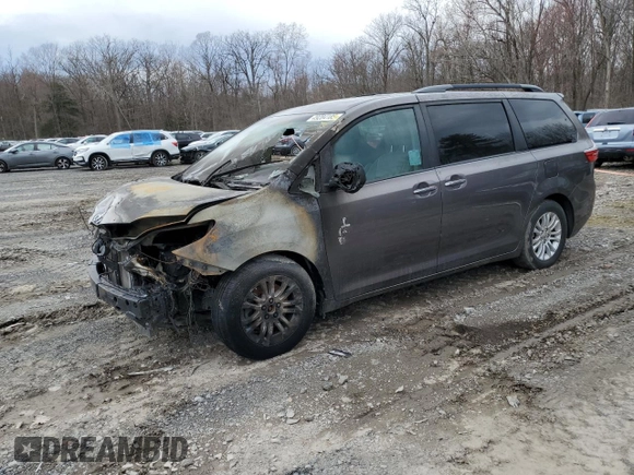 2015 Toyota Sienna XLE with VIN 5TDYK3DC4FS574285, listed as a Copart auction lot 49284185 with 0 mi miles and Salvage Title. Bid and sale history available at carsss.com. Image 1.