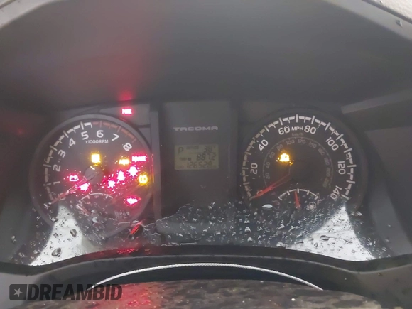 2016 Toyota Tacoma SR z VIN 5TFSX5ENXGX042148, wystawiony jako IAAI lot #41592688 z przebiegiem 126 528 mil mil oraz . Historia ofert i sprzedaży dostępna na DreamBid. Obrazek 7.