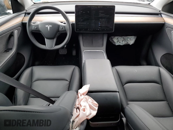 2025 Tesla Model Y Long Range with VIN 7SAYGDED9SA341967, listed as a Copart auction lot 47368695 with 4,310 mi miles and Salvage Title. Bid and sale history available at DreamBid. Image 8.