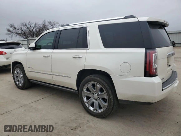 2015 GMC Yukon Denali with VIN 1GKS1CKJ5FR293612, listed as a Copart auction lot 47625975 with 98,533 mi miles and Salvage Title. Bid and sale history available at carsss.com. Image 2.