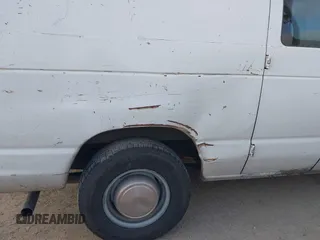 1999 Ford Econoline Cargo Commercial with VIN 1FTNE24L3XHB84868, listed as a IAAI auction lot 41151145 with 450,651 mi miles and . Bid and sale history available at carsss.com. Image 13.