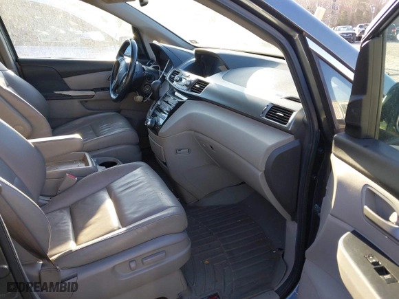 2013 Honda Odyssey Touring with VIN 5FNRL5H9XDB009973, listed as a IAAI auction lot 41904710 with 219,067 mi miles. Bid and sale history available at carsss.com. Image 5.