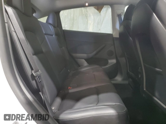 2022 Tesla Model Y Performance with VIN 7SAYGDEF7NF520825, listed as a Copart auction lot 57400245 with 55,437 mi miles and Salvage title. Bid and sale history available at DreamBid. Image 11.