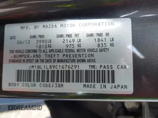 2012 Mazda Mazda3 i Touring with VIN JM1BL1L89C1676291, listed as a IAAI auction lot 42087895 with 61,805 mi miles. Bid and sale history available at carsss.com. Image 9.