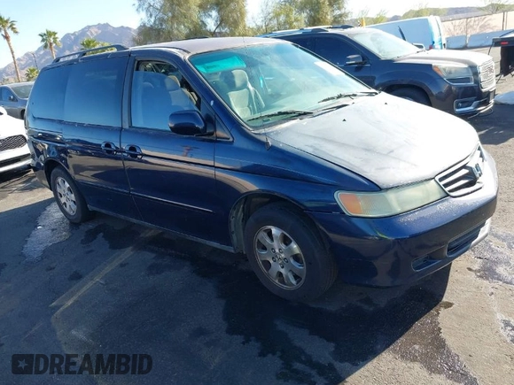 2004 Honda Odyssey EX z VIN 5FNRL18614B080980, wystawiony jako IAAI lot #41940014 z przebiegiem 233 465 mil mil oraz . Historia ofert i sprzedaży dostępna na DreamBid. Obrazek 1.