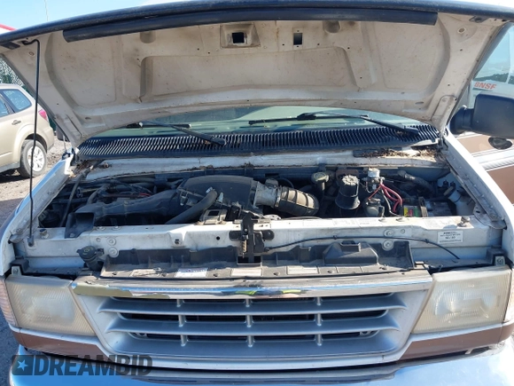 1996 Ford Econoline Cargo with VIN 1FDEE14N4THA59332, listed as a IAAI auction lot 42514910 with 107,511 mi miles and . Bid and sale history available at DreamBid. Image 10.