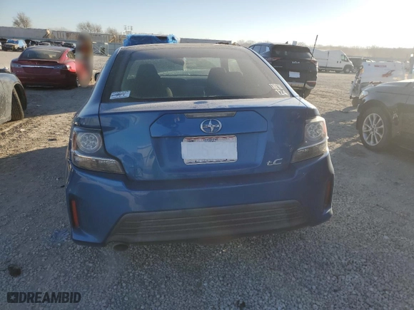 2015 Scion tC with VIN JTKJF5C72FJ012056, listed as a Copart auction lot 83813504 with 131,014 mi miles and Salvage Title. Bid and sale history available at carsss.com. Image 6.