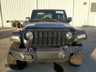 2022 Jeep Wrangler Unlimited High Tide with VIN 1C4HJXDG0NW247152, listed as a Copart auction lot 82371674 with 32,417 mi miles and Salvage Title. Bid and sale history available at DreamBid. Image 5.