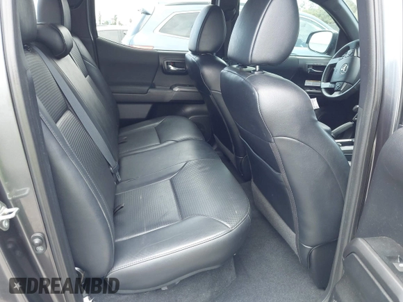 2019 Toyota Tacoma SR with VIN 3TMCZ5AN3KM207783, listed as a IAAI auction lot 42375280 with 55,784 mi miles and . Bid and sale history available at DreamBid. Image 8.