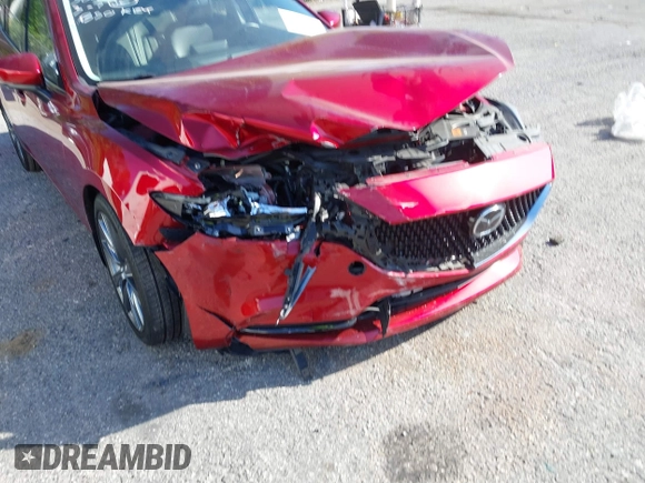 2018 Mazda 6 Grand Touring with VIN JM1GL1TY1J1302146, listed as a IAAI auction lot 41788881 with 55,852 mi miles and . Bid and sale history available at DreamBid. Image 6.