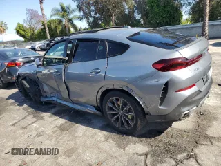 2025 BMW X6 xDrive40i z VIN 5UX33EX03S9X00132, wystawiony jako Copart lot #56373235 z przebiegiem Nie podano mil oraz Tytuł czysty. Historia ofert i sprzedaży dostępna na DreamBid. Obrazek 2.