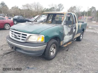 1999 Ford F-150 Work Series with VIN 1FTRX17W1XNB99012, listed as a IAAI auction lot 41412216 with 1 mi miles. Bid and sale history available at carsss.com. Image 2.