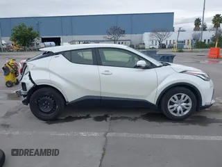 2021 Toyota C-HR LE with VIN JTNKHMBX1M1098521, listed as a IAAI auction lot 41539775 with 14,840 mi miles. Bid and sale history available at carsss.com. Image 14.