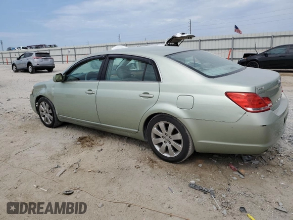 2006 Toyota Avalon XL with VIN 4T1BK36B06U075940, listed as a Copart auction lot 56022995 with 150,609 mi miles and Salvage Title. Bid and sale history available at DreamBid. Image 2.