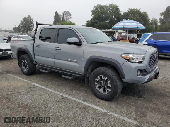 2021 Toyota Tacoma SR with VIN 3TMCZ5AN4MM402889, listed as a Copart auction lot 59942695 with 61,504 mi miles and Salvage title. Bid and sale history available at DreamBid. Image 4.