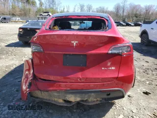 2021 Tesla Model Y Long Range with VIN 5YJYGAEE4MF260627, listed as a Copart auction lot 49091655 with 67,850 mi miles and Salvage Title. Bid and sale history available at DreamBid. Image 6.