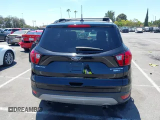 2019 Ford Escape Titanium with VIN 1FMCU9J98KUA21480, listed as a IAAI auction lot 42698275 with 65,478 mi miles and . Bid and sale history available at DreamBid. Image 16.