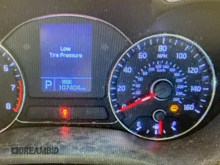 2016 Kia Forte EX z VIN KNAFZ4A87G5550317, wystawiony jako Copart lot #52009755 z przebiegiem 107 404 mil mil oraz Nie do naprawy • Non repairable. Historia ofert i sprzedaży dostępna na DreamBid. Obrazek 9.