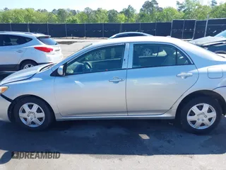 2009 Toyota Corolla with VIN 1NXBU40E99Z100681, listed as a IAAI auction lot 41973116 with 119,744 mi miles. Bid and sale history available at carsss.com. Image 14.
