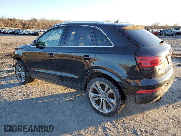 2015 Audi Q3 2.0T Prestige with VIN WA1GFCFS5FR010772, listed as a Copart auction lot 45697865 with 104,705 mi miles and Salvage Title. Bid and sale history available at carsss.com. Image 2.