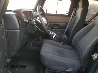 2005 Jeep Wrangler SE with VIN 1J4FA29155P363501, listed as a Copart auction lot 80388314 with 97,564 mi miles and Clean Title. Bid and sale history available at carsss.com. Image 7.