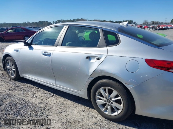 2016 Kia Optima LX with VIN 5XXGT4L37GG015462, listed as a IAAI auction lot 41247091 with 165,755 mi miles and . Bid and sale history available at DreamBid. Image 6.