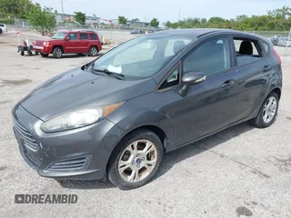 2016 Ford Fiesta SE with VIN 3FADP4EJ4GM129006, listed as a IAAI auction lot 42085892 with 146,044 mi miles. Bid and sale history available at carsss.com. Image 2.