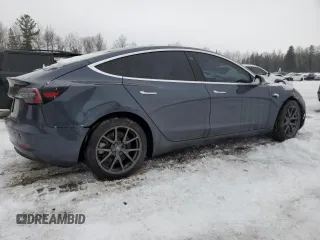 2019 Tesla Model 3 Mid Range with VIN 5YJ3E1EA1KF528950, listed as a Copart auction lot 43344475 with 57,272 mi miles and Clean Title. Bid and sale history available at DreamBid. Image 3.