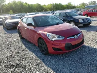 2014 Hyundai Veloster z VIN KMHTC6AD8EU213234, wystawiony jako Copart lot #53297535 z przebiegiem 131 769 mil mil oraz Szkoda całkowita • Salvage title. Historia ofert i sprzedaży dostępna na DreamBid. Obrazek 11.