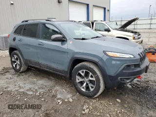 2014 Jeep Cherokee Trailhawk with VIN 1C4PJMBB9EW251749, listed as a Copart auction lot 49712915 with 94,289 mi miles and Clean Title. Bid and sale history available at carsss.com. Image 4.