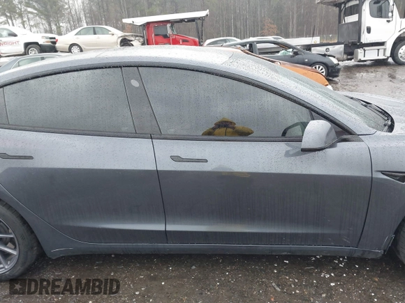 2023 Tesla Model 3 z VIN 5YJ3E1EA3PF579776, wystawiony jako IAAI lot #41537794 z przebiegiem Nie podano mil oraz . Historia ofert i sprzedaży dostępna na DreamBid. Obrazek 13.