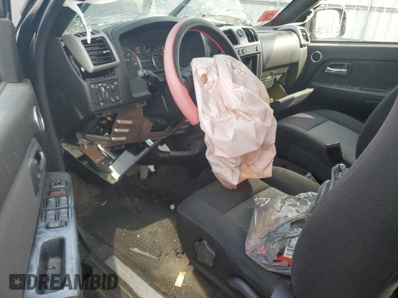 2011 GMC Canyon SLE1 z VIN 1GTH6MFE7B8108339, wystawiony jako Copart lot #79999954 z przebiegiem Nie podano mil oraz Szkoda całkowita • Salvage title. Historia ofert i sprzedaży dostępna na DreamBid. Obrazek 8.