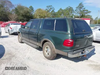 2003 Ford F-150 XLT with VIN 1FTRW07L53KA64064, listed as a IAAI auction lot 41697350 with 227,114 mi miles. Bid and sale history available at carsss.com. Image 3.