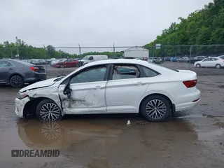 2021 Volkswagen Jetta S z VIN 3VWC57BU9MM103778, wystawiony jako IAAI lot #42493041 z przebiegiem 74 723 mil mil oraz . Historia ofert i sprzedaży dostępna na DreamBid. Obrazek 14.