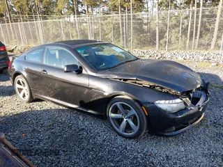 2008 BMW 6 Series 650i with VIN WBAEA53538CV90709, listed as a IAAI auction lot 41678425 with 104,825 mi miles. Bid and sale history available at carsss.com. Image 13.