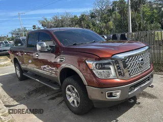 2016 Nissan Titan SL z VIN 1N6BA1F20GN510413, wystawiony jako Copart lot #48017425 z przebiegiem 225 717 mil mil oraz Czysty tytuł • Clean title. Historia ofert i sprzedaży dostępna na DreamBid. Obrazek 1.
