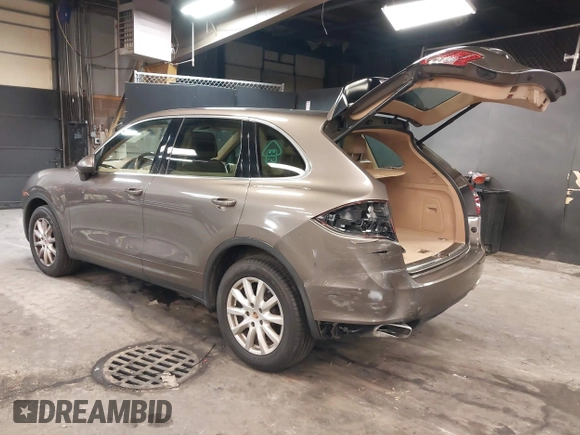 2014 Porsche Cayenne with VIN WP1AA2A26ELA93026, listed as a IAAI auction lot 42272409 with 58,951 mi miles and . Bid and sale history available at DreamBid. Image 3.