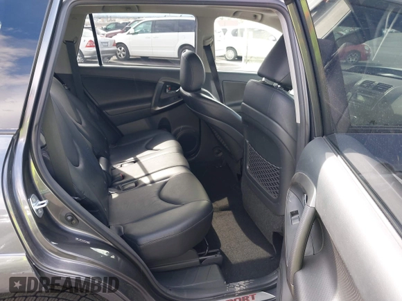 2012 Toyota RAV4 Sport with VIN JTMWF4DV8C5046592, listed as a IAAI auction lot 42207047 with 107,210 mi miles and . Bid and sale history available at DreamBid. Image 8.