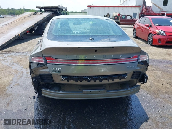 2016 Lincoln MKZ z VIN 3LN6L2J97GR617086, wystawiony jako IAAI lot #42446924 z przebiegiem 107 591 mil mil oraz . Historia ofert i sprzedaży dostępna na DreamBid. Obrazek 16.