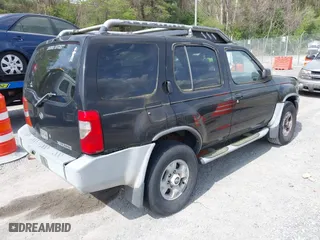 2000 Nissan Xterra XE with VIN 5N1ED28Y9YC604703, listed as a IAAI auction lot 42095801 with 250,603 mi miles. Bid and sale history available at carsss.com. Image 4.