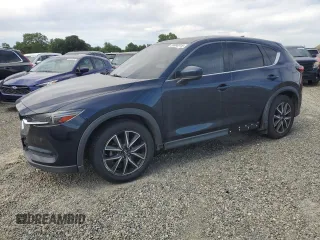 2017 Mazda CX-5 Grand Touring with VIN JM3KFADL2H0221149, listed as a Copart auction lot 50606915 with 140,518 mi miles and Clean Title. Bid and sale history available at carsss.com. Image 1.