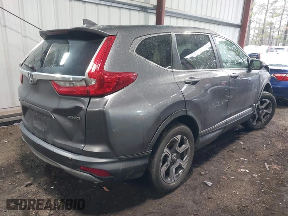 2018 Honda CR-V EX with VIN 7FARW2H56JE043542, listed as a IAAI auction lot 41560270 with 104,237 mi miles and . Bid and sale history available at DreamBid. Image 4.