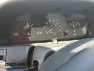 1993 Ford Escort z VIN 1FAPP15J6PW366026, wystawiony jako Copart lot #73279994 z przebiegiem 81 531 mil mil oraz Szkody całkowita. Historia ofert i sprzedaży dostępna na DreamBid. Obrazek 9.