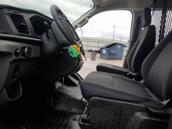 2024 Ford Transit Cargo with VIN 1FTBR1Y82RKA62547, listed as a Copart auction lot 51338505 with 6,979 mi miles and Clean Title. Bid and sale history available at DreamBid. Image 7.