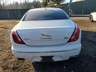 2014 Jaguar XJ with VIN SAJWJ2GD2E8V61998, listed as a Copart auction lot 42962645 with 101,609 mi miles and Salvage Title. Bid and sale history available at carsss.com. Image 6.